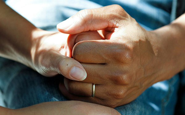 hand_holding_support_stock_image_600x375